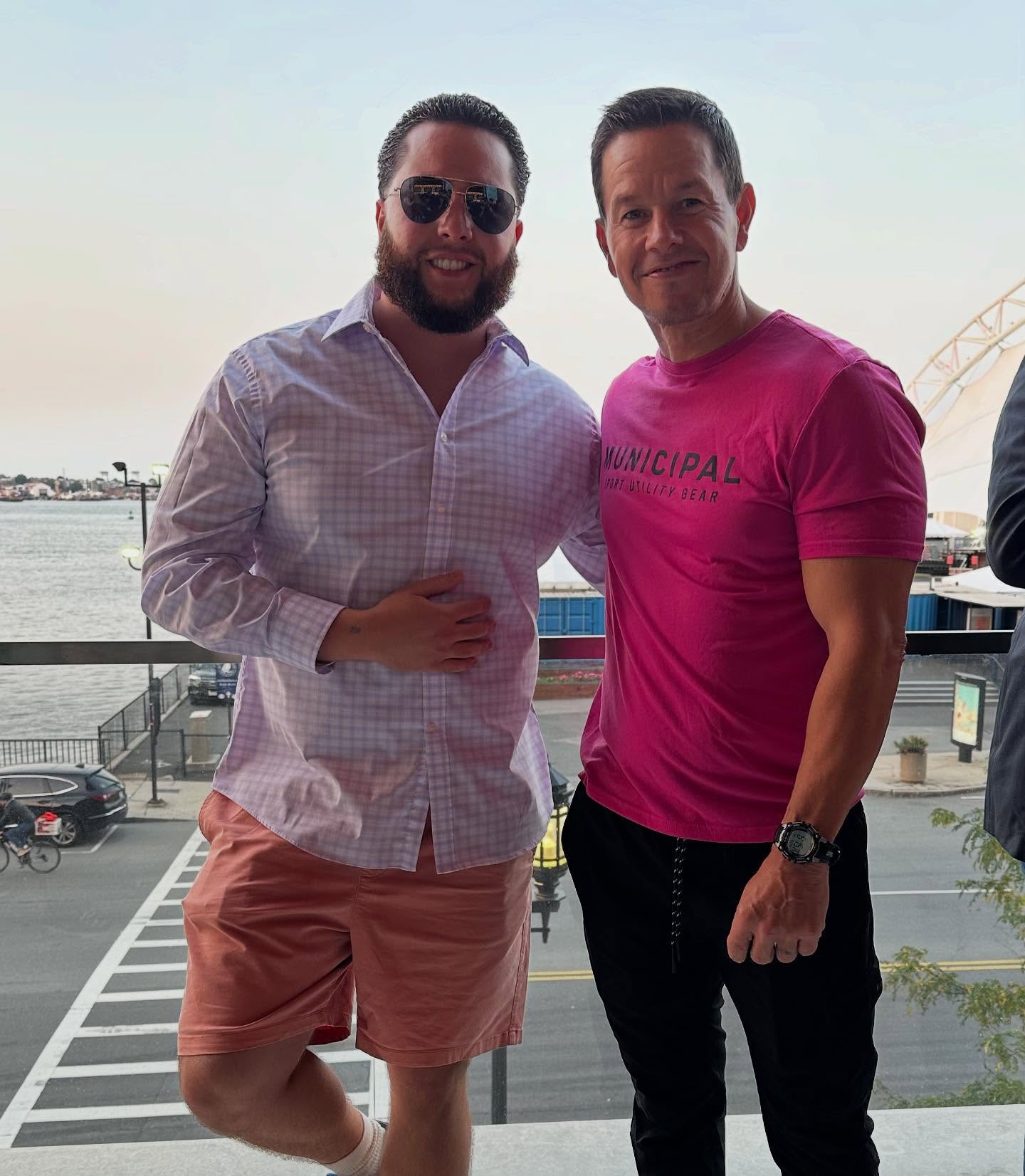 C-Money and Mark Wahlberg by the waterfront.