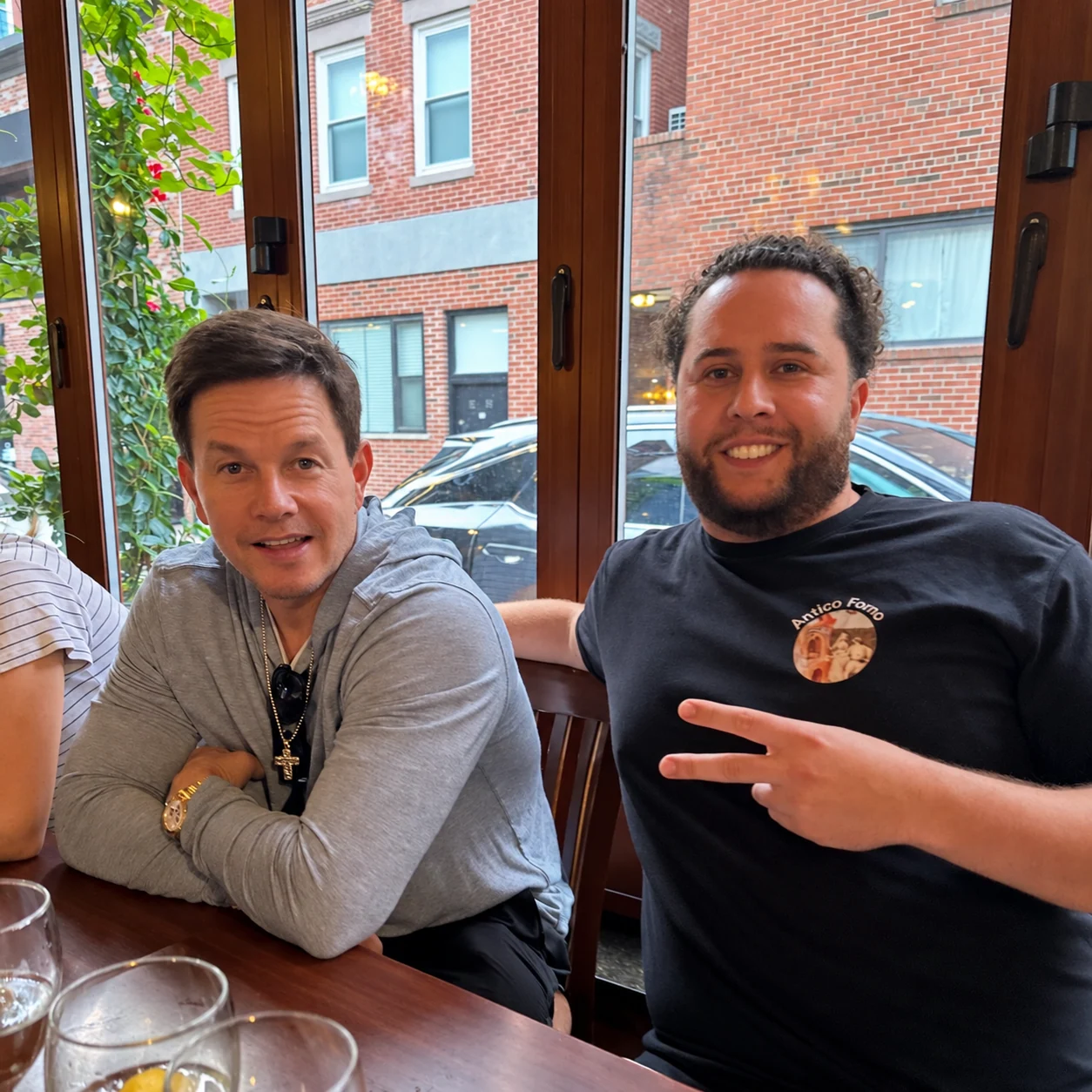 C-Money and Mark Wahlberg at a restaurant, from C-Money’s December 1, 2025 Instagram post.